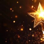 A shining star on top of a trophy.
