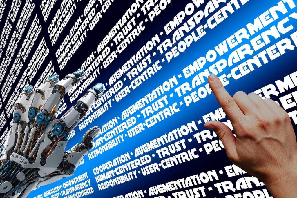 Robot hand and human hand hover over screen with collective intelligence phrases.