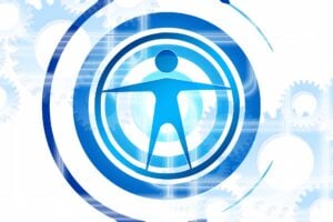 Human in center of circles surrounded by circles and gears like a machine or process.