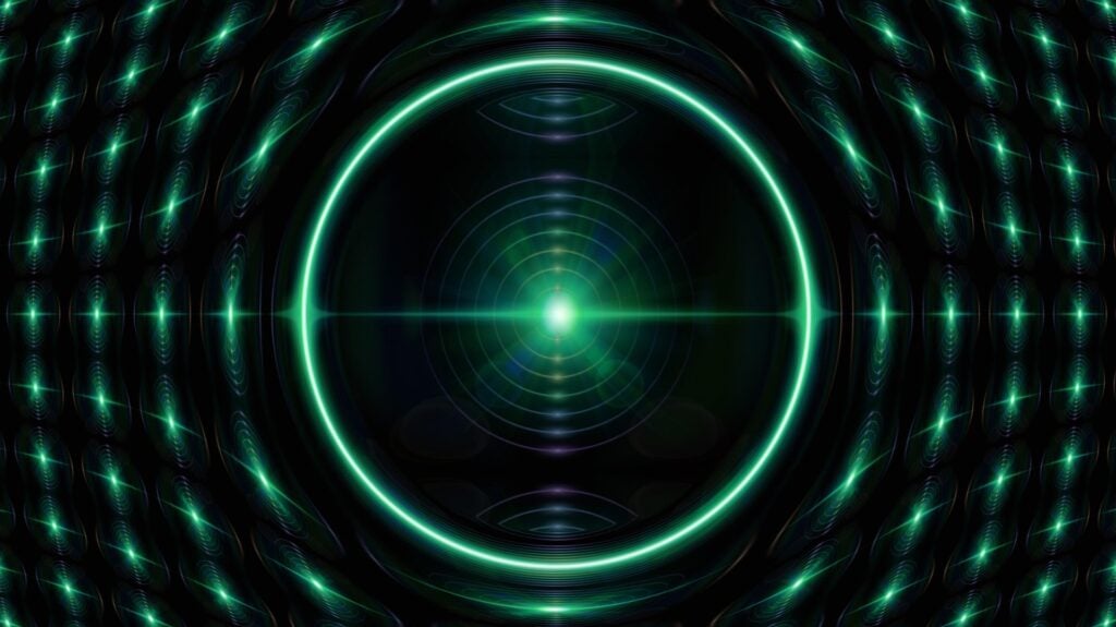 Futuristic lasers and lights in a pattern, with circles centered on an AI-like core.