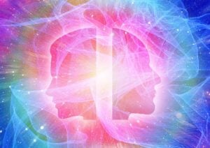 Illustration of a man and woman faces in profile, swirling ribbons of light, defining consciousness.