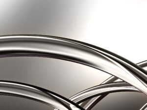 Shiny metal curving pipes or spokes.