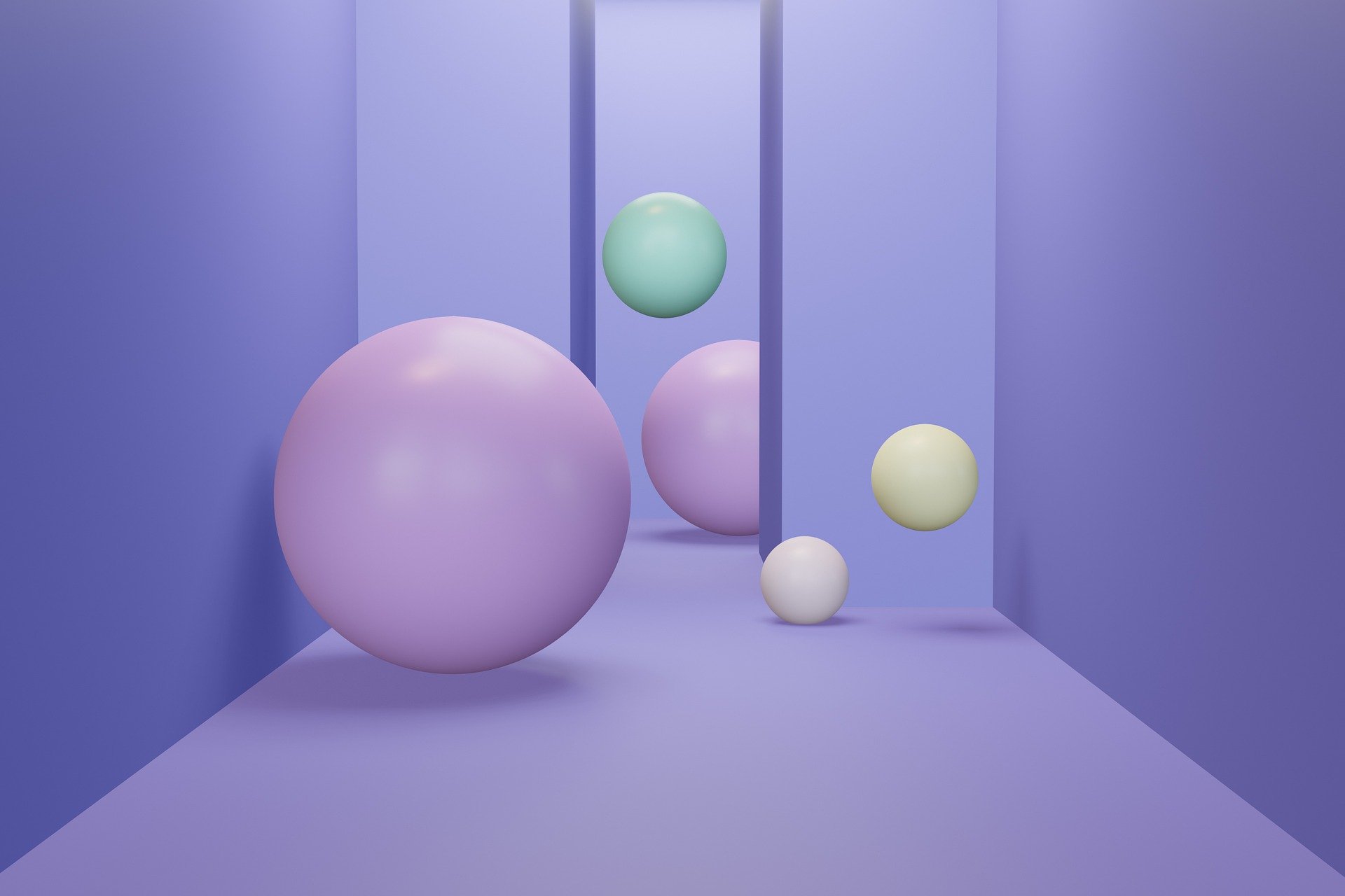Abstract rendering of a variety of colorful spheres in different sizes.